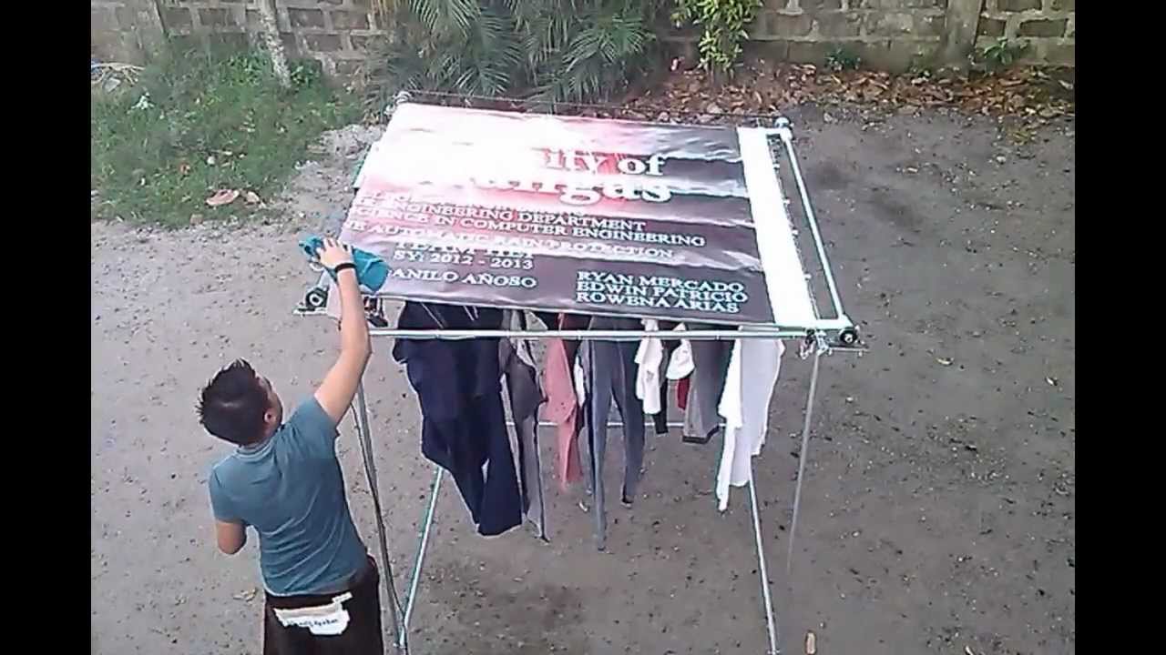 CLOTHESLINE AUTOMATIC RAIN PROTECTOR - Team HEI   (HitachiGST-WD EMERSON IMI)