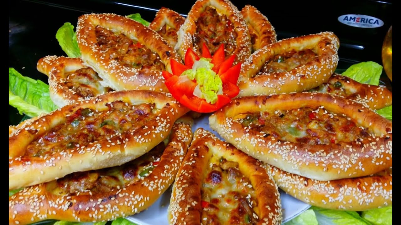 قوارب البيتزا التركيه ..جربوها  لا تفوتكم ..من الاخير فد شي خيالي