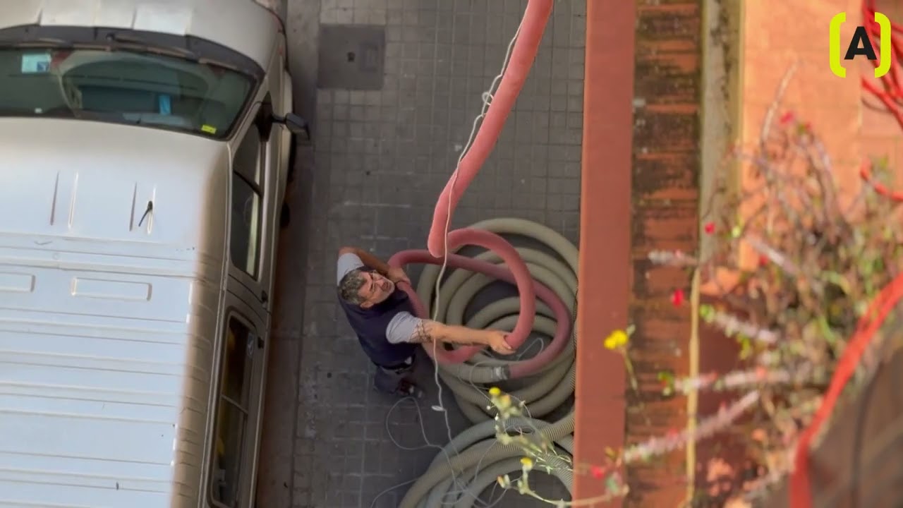 Aislamiento de tabique pluvial con celulosa en Barcelona | Trabajos verticales con QParadis