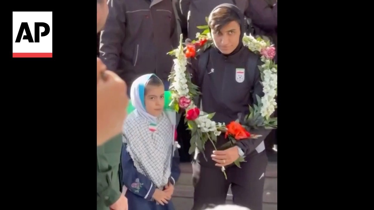 Iranian media shows video of its women's soccer team arriving in Iran