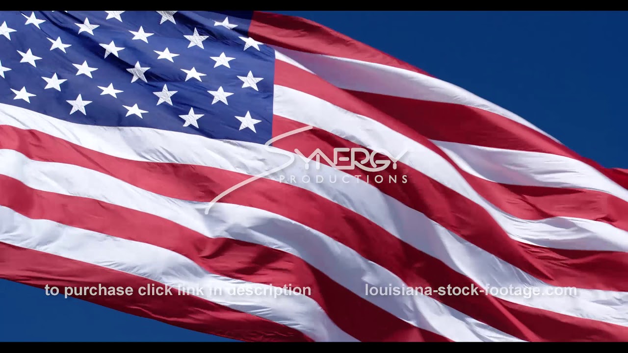 1276 dramatic american flag in slow motion video stock footage