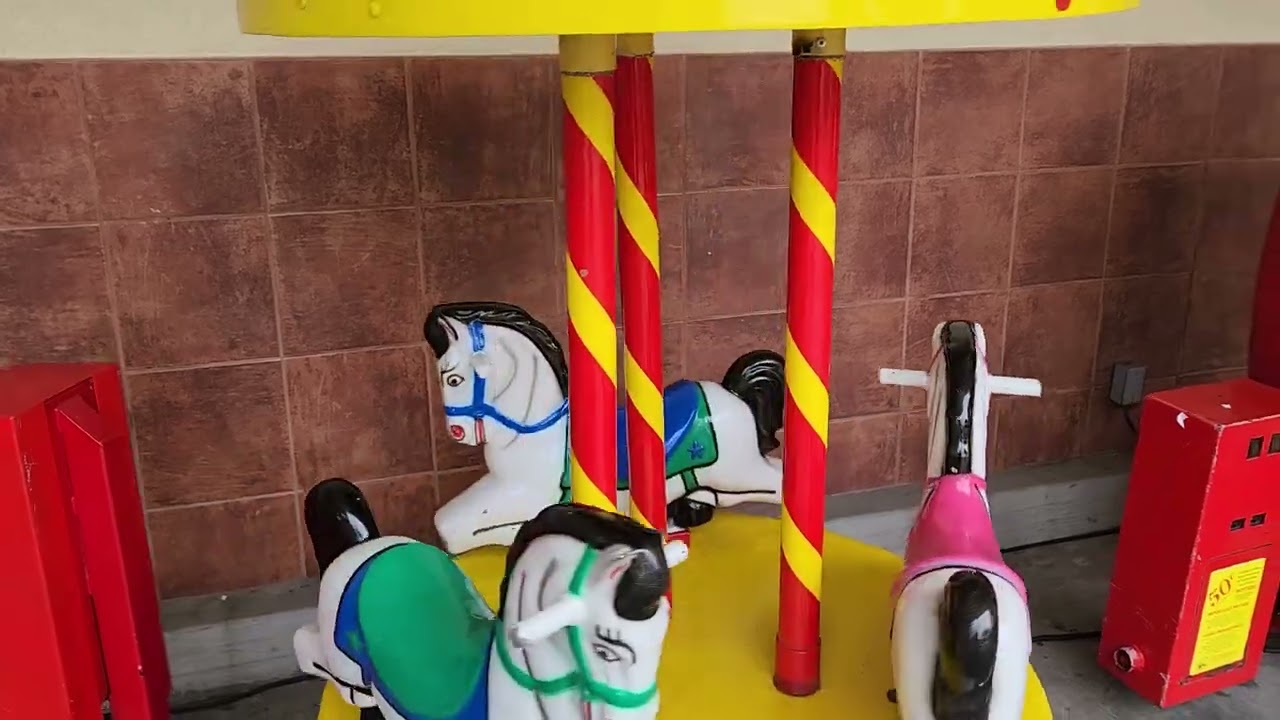 1970s Mini carousel kiddie ride (scarlet red, yellow and white)