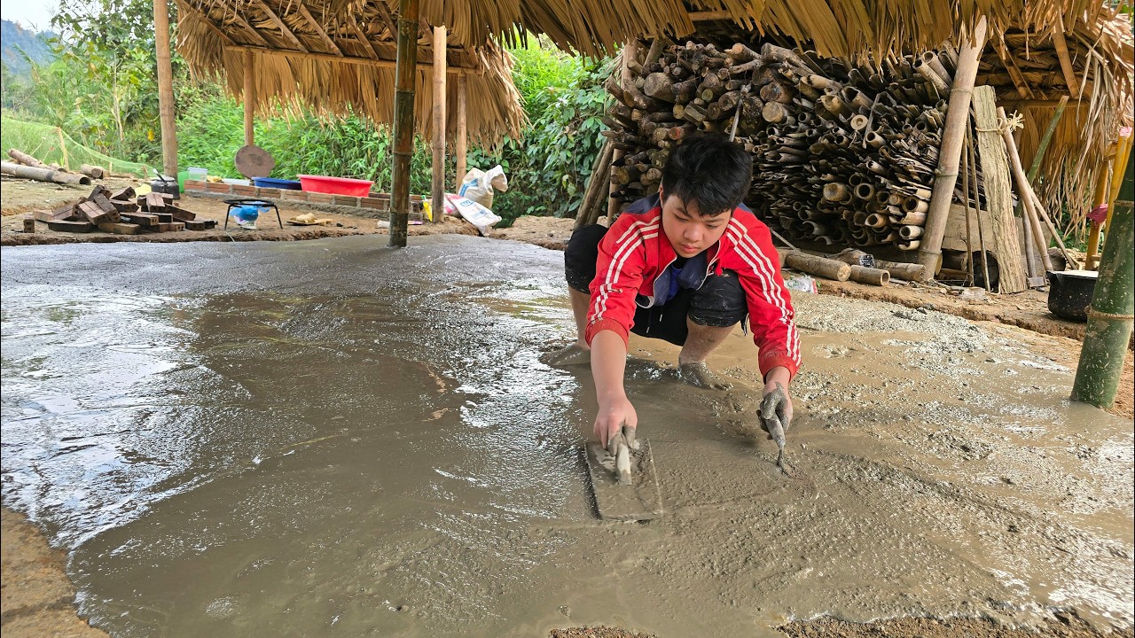 Thanh cleaned up the small kitchen and mix concrete to spread on the kitchen floor to make it clean