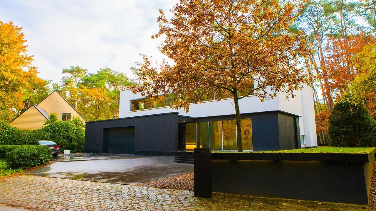 Architectenwoning (M. Muylaert) met 4 slaapkamers en kantoren te koop te Bonheiden - Rosini Estate