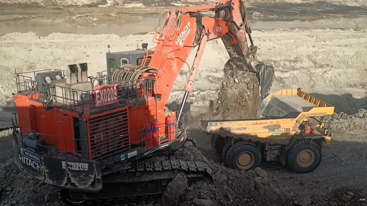 Insane Hitachi EX2600 Excavator Digging & Loading Overburden into Dump Trucks