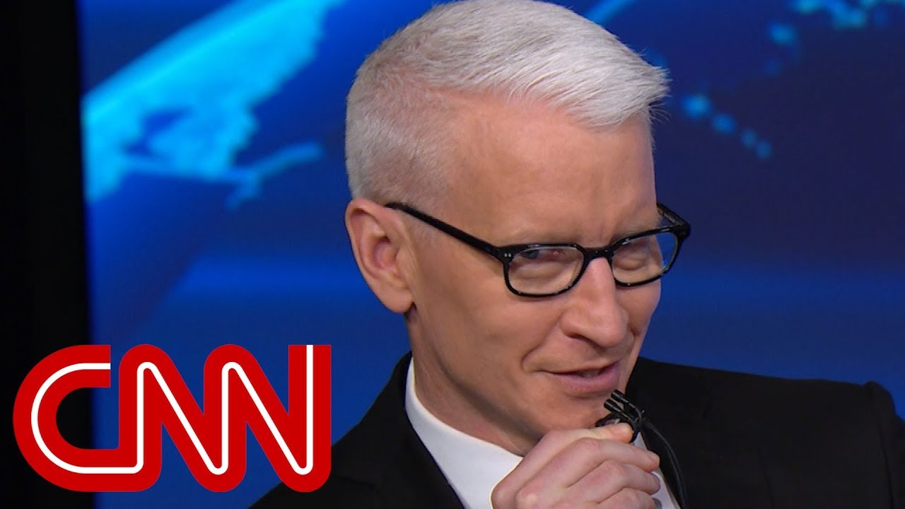 Anderson Cooper mocks Omarosa whispering about Trump