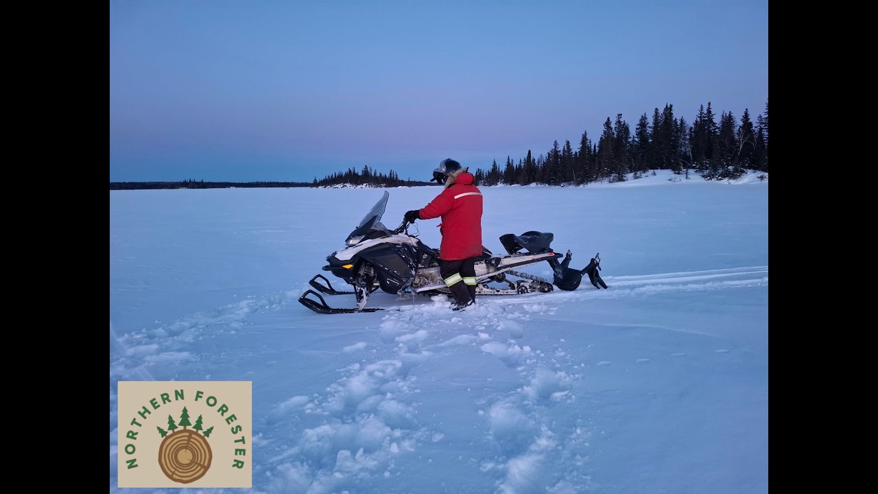Rescuing snowmobile from the lake