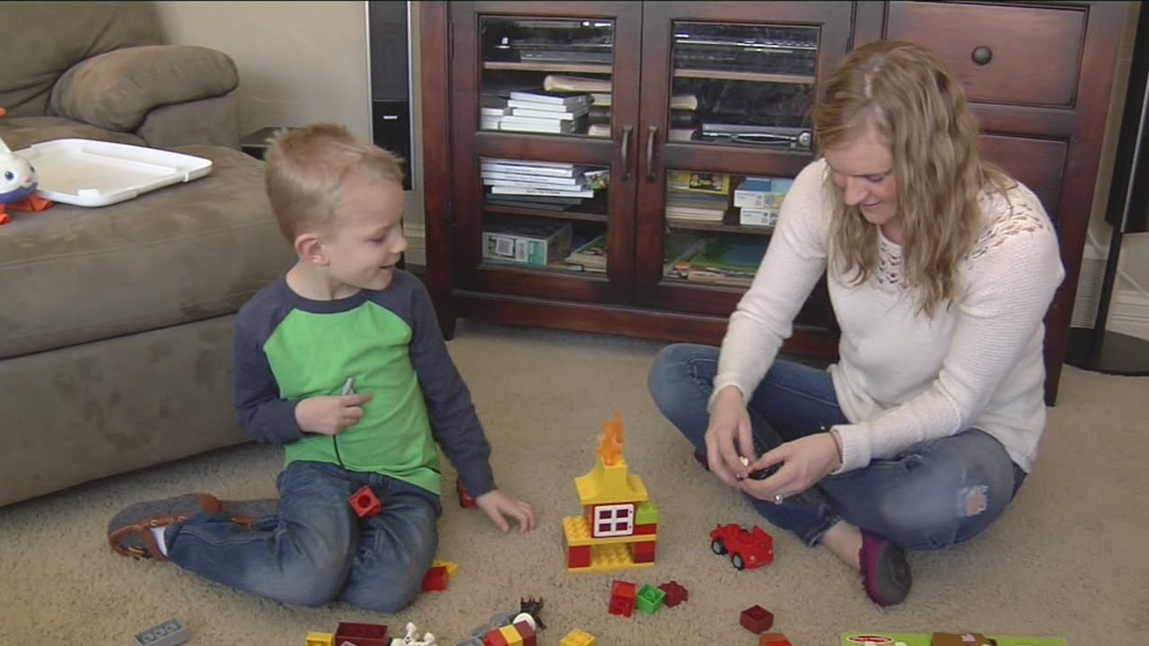 Mom caring for child with brain damage diagnosed with tumor