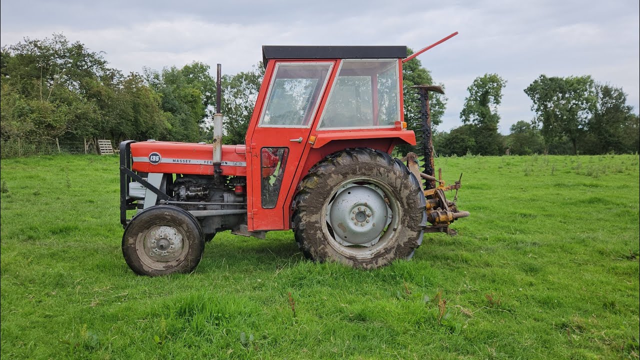 vintage topping with mf 135 and finger bar mower