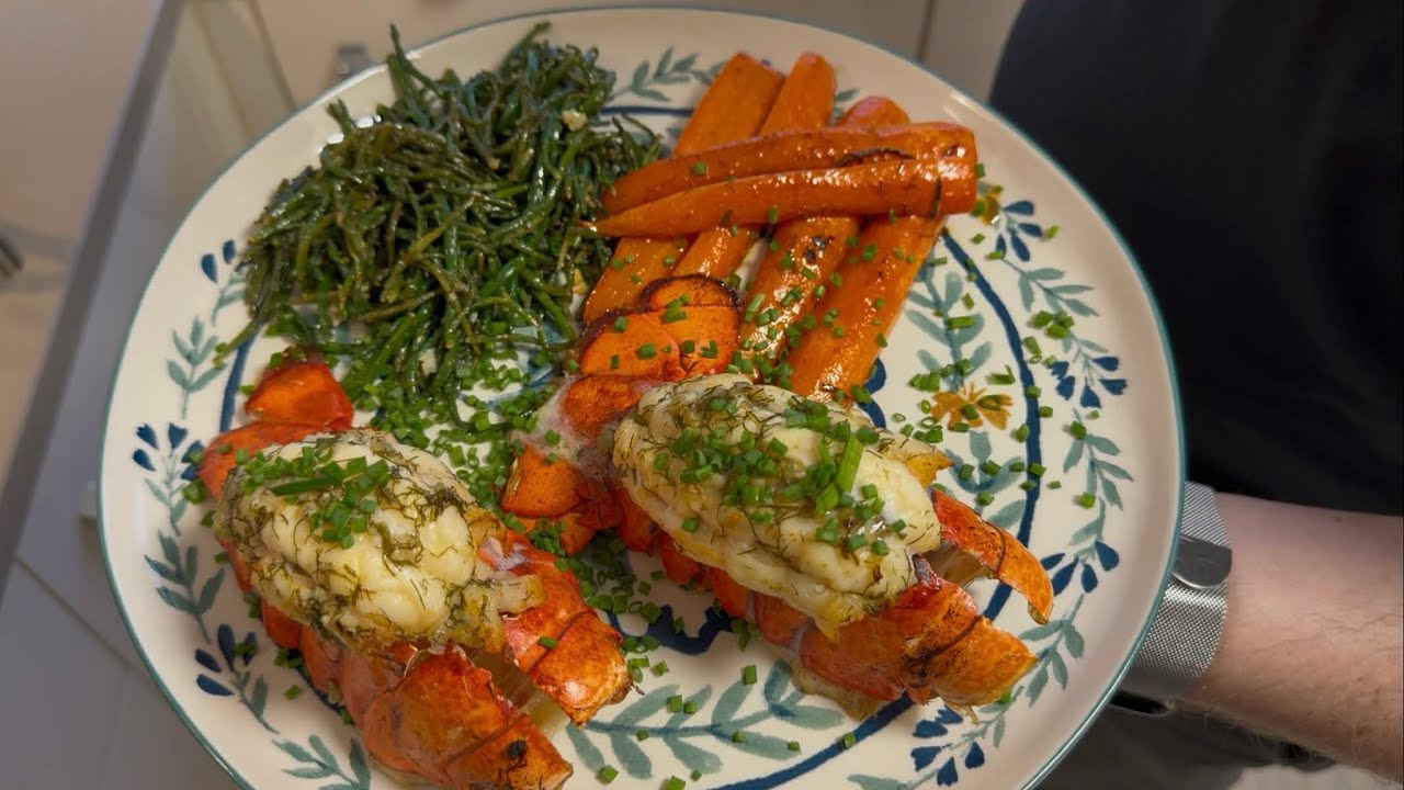 Lobster Tails with Garlic Lemon Butter Sauce garnished with Samphire and Carrots cooked with love 