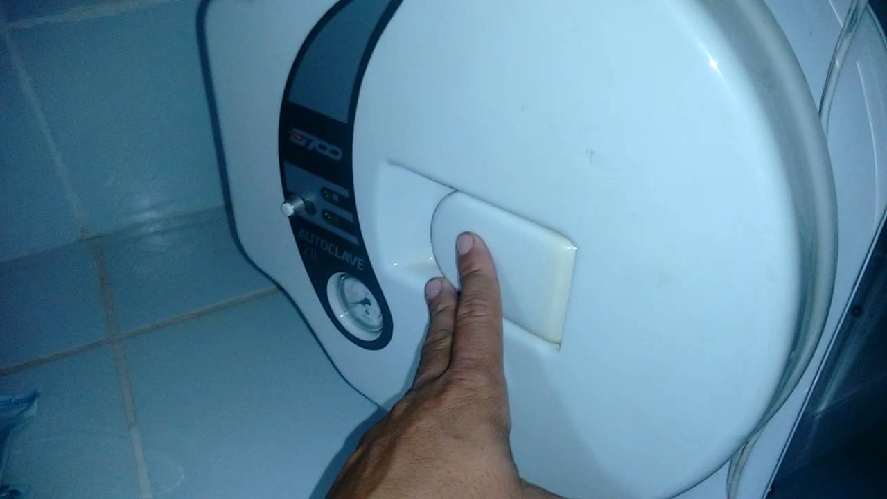 Como abrir porta do autoclave d700 travada