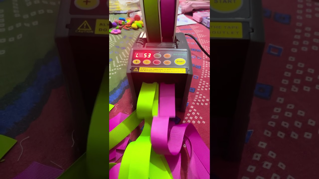 Automatic ribbon cutting machine 