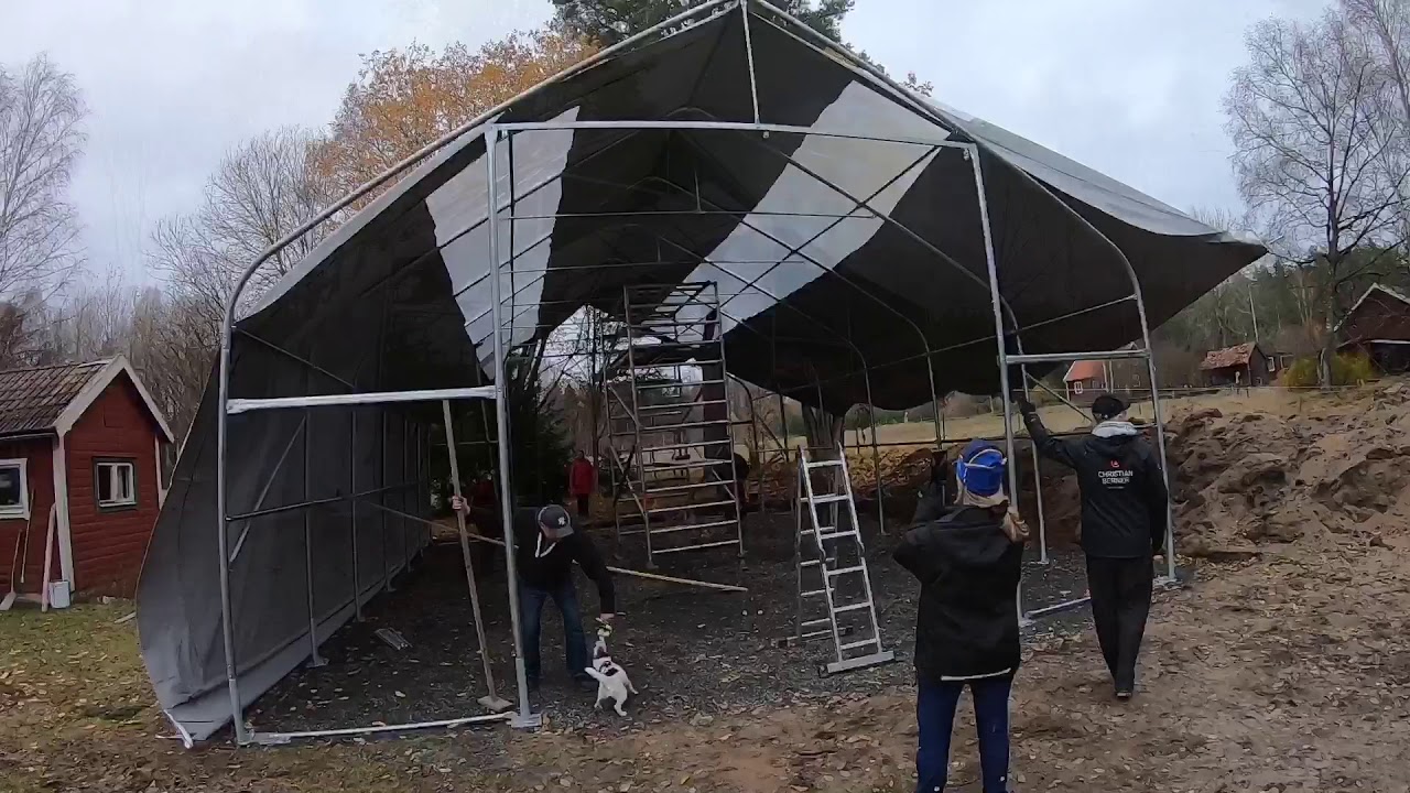 Helping dad with a tent hall