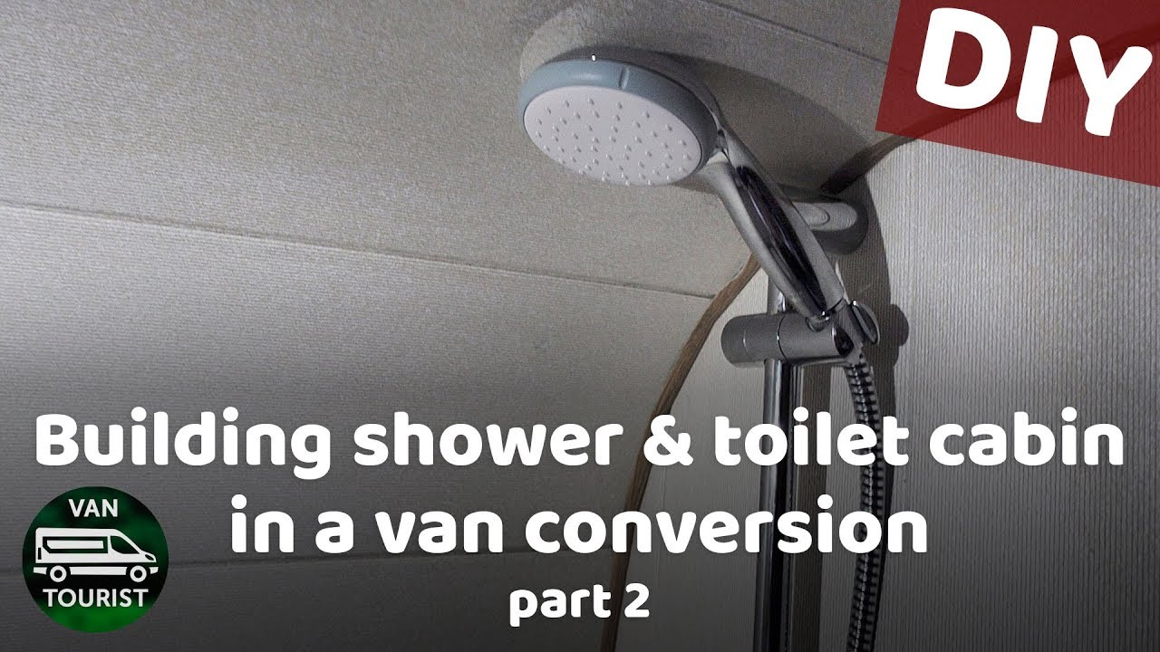 Bathroom building in van conversion. Plastic paneling, shower tray, mixer tap, shower head, piping