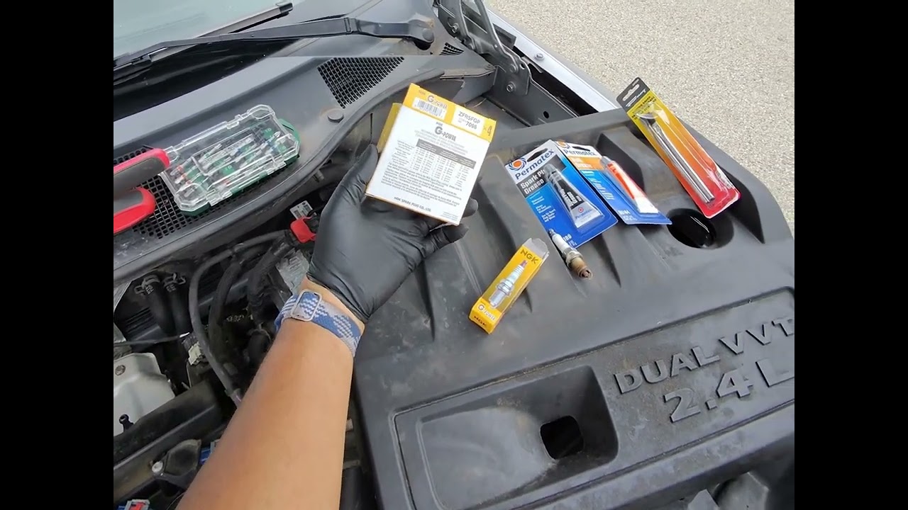 Changing spark plugs 2016 Jeep Patriot Latitude