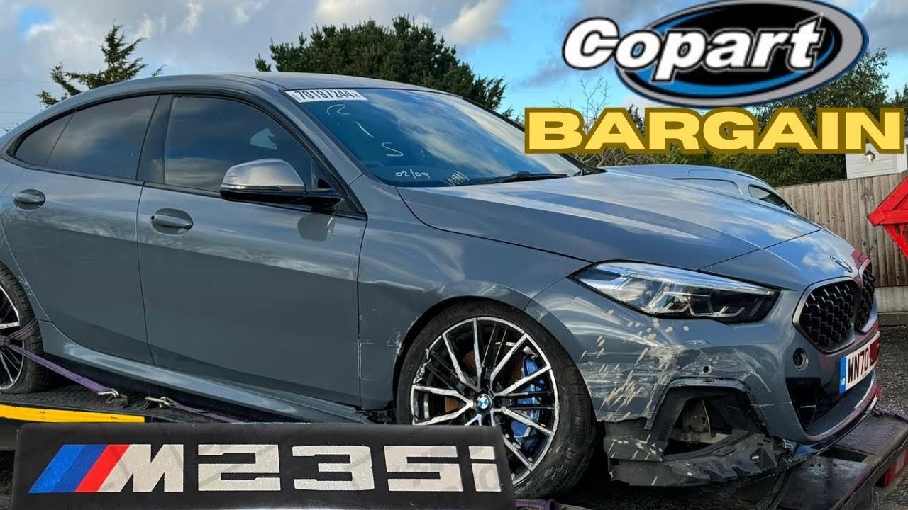 WE BOUGHT A CRASH DAMAGED BMW M235i FROM COPART SALVAGE AUCTION
