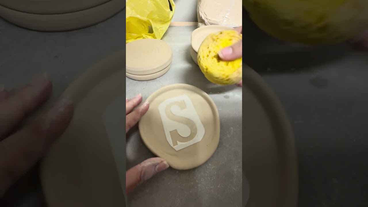 Water etching technique on handmade pottery