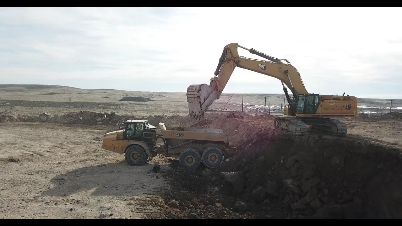 CAT 395 Excavator Loading Haul Trucks | Mass Excavation