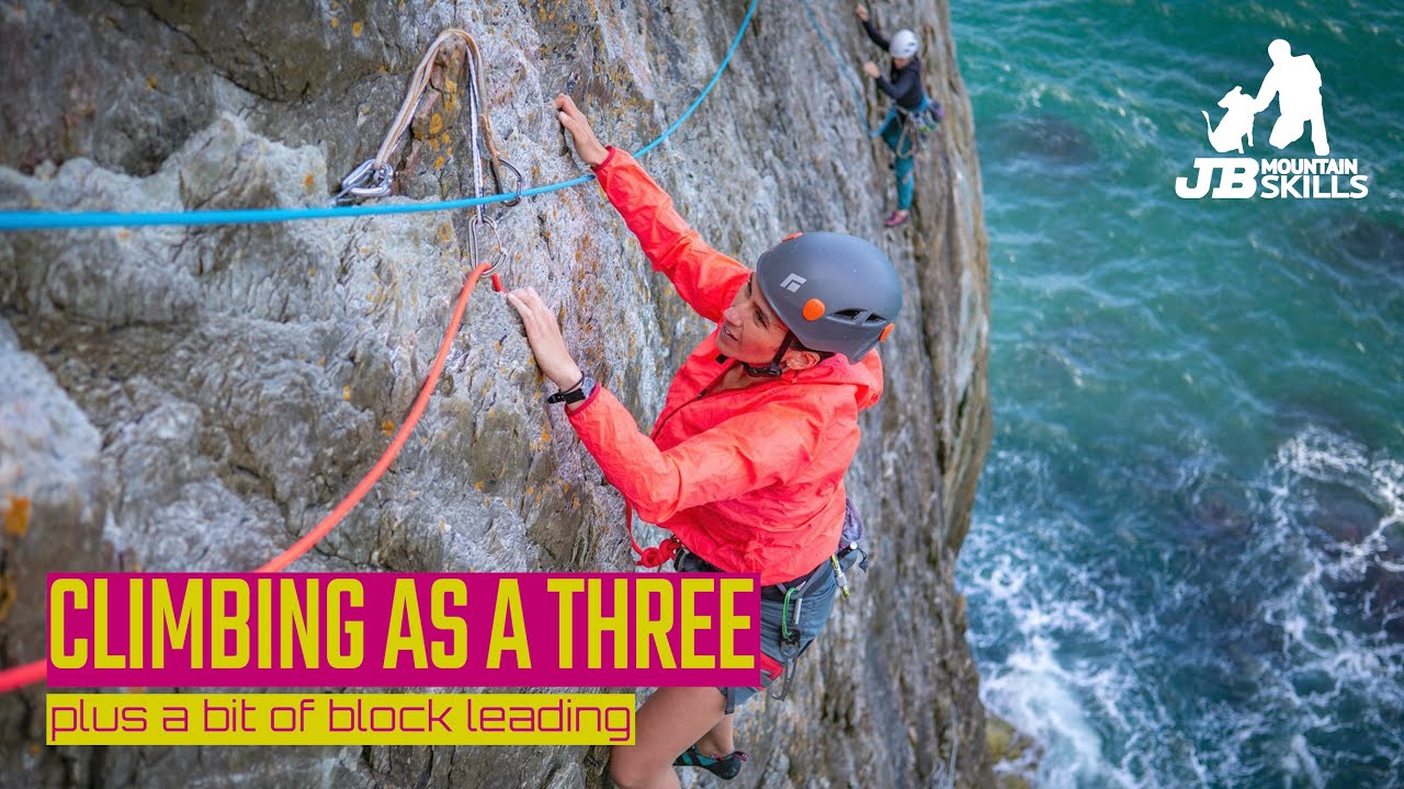 Rock climbing in a three, with a bit of block leading chat too, in the wind!!!