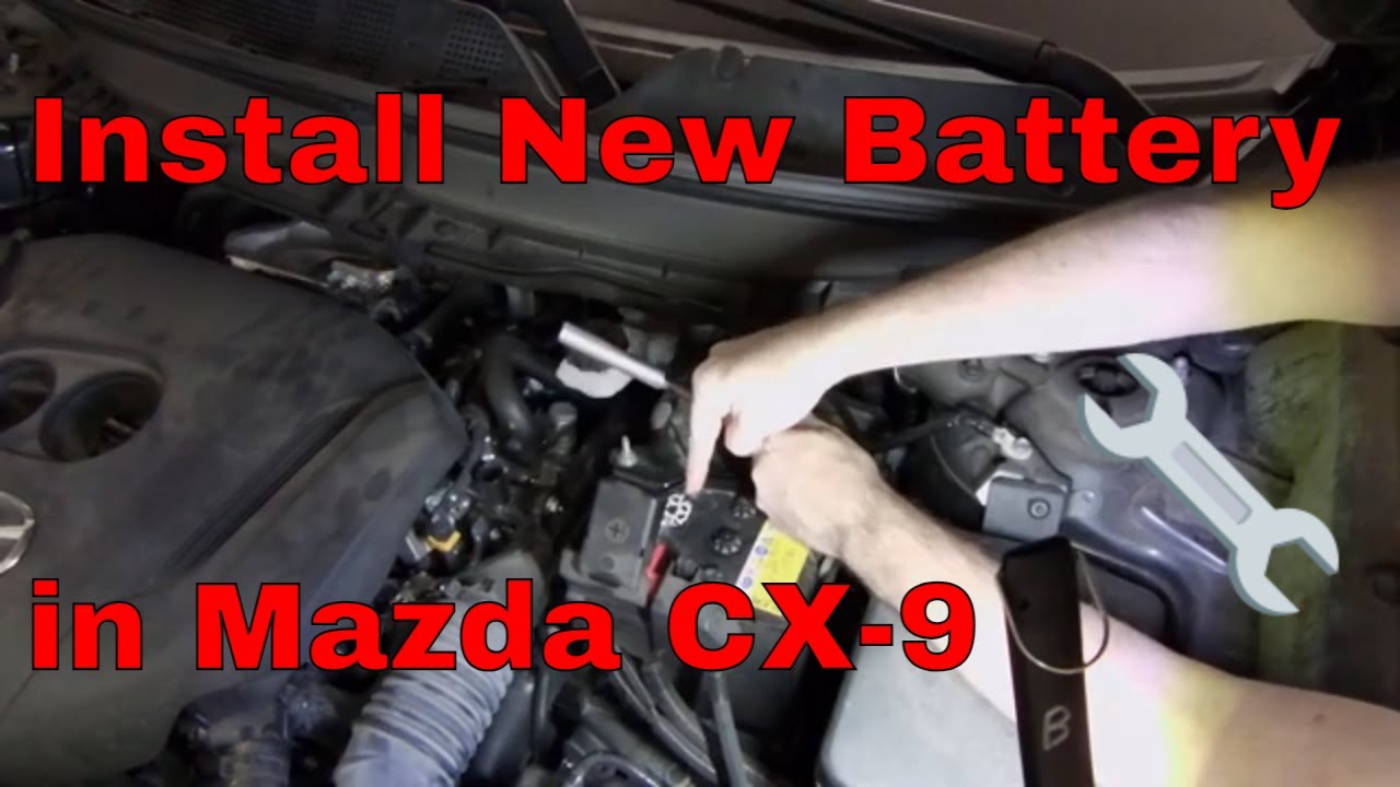 How to install a new battery on a Mazda CX-9