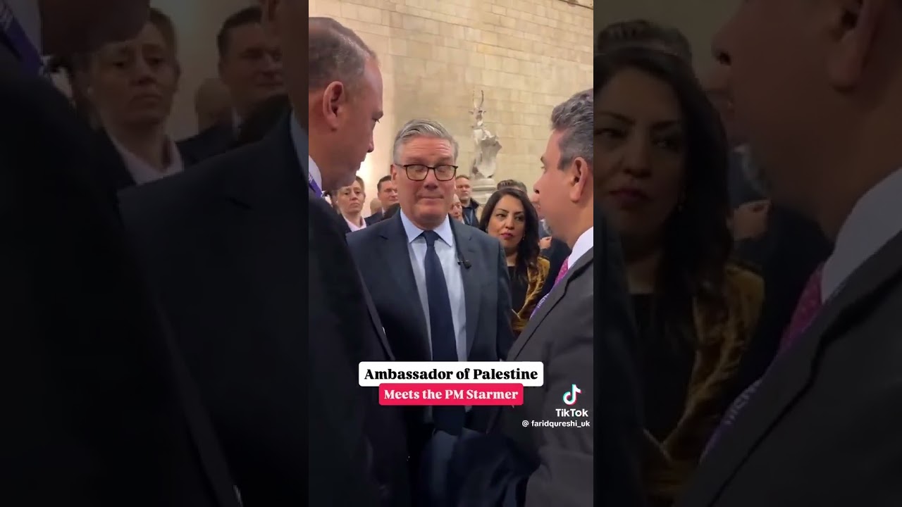 Keir Starmer gets rubbed by the Palestinian Ambassador as he whispers in his ear.
