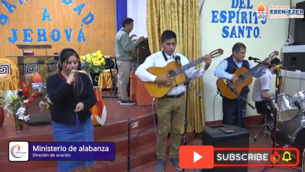 Alabando con guitarra, batería y la voz