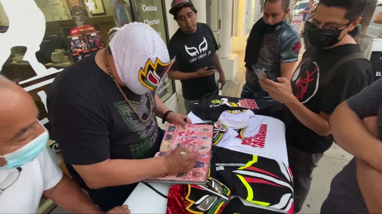 Mascara Sagrada, Fishman, y Angel Blanco firma de autógrafo a en el pollo fino