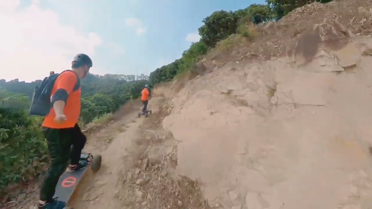 Riding Ecomobl ET2 Pro 2WD 12S5P Electric Longboard  on the Mountain