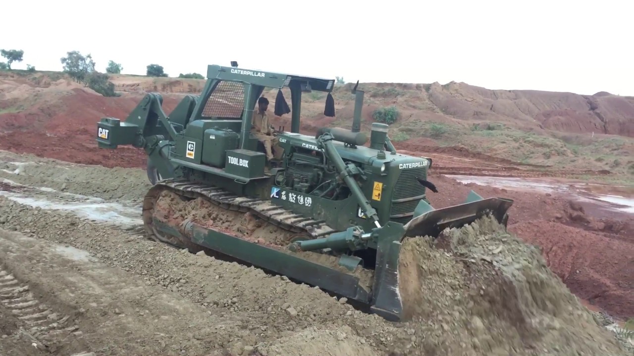 Rebuilt Cat D8K pushing!