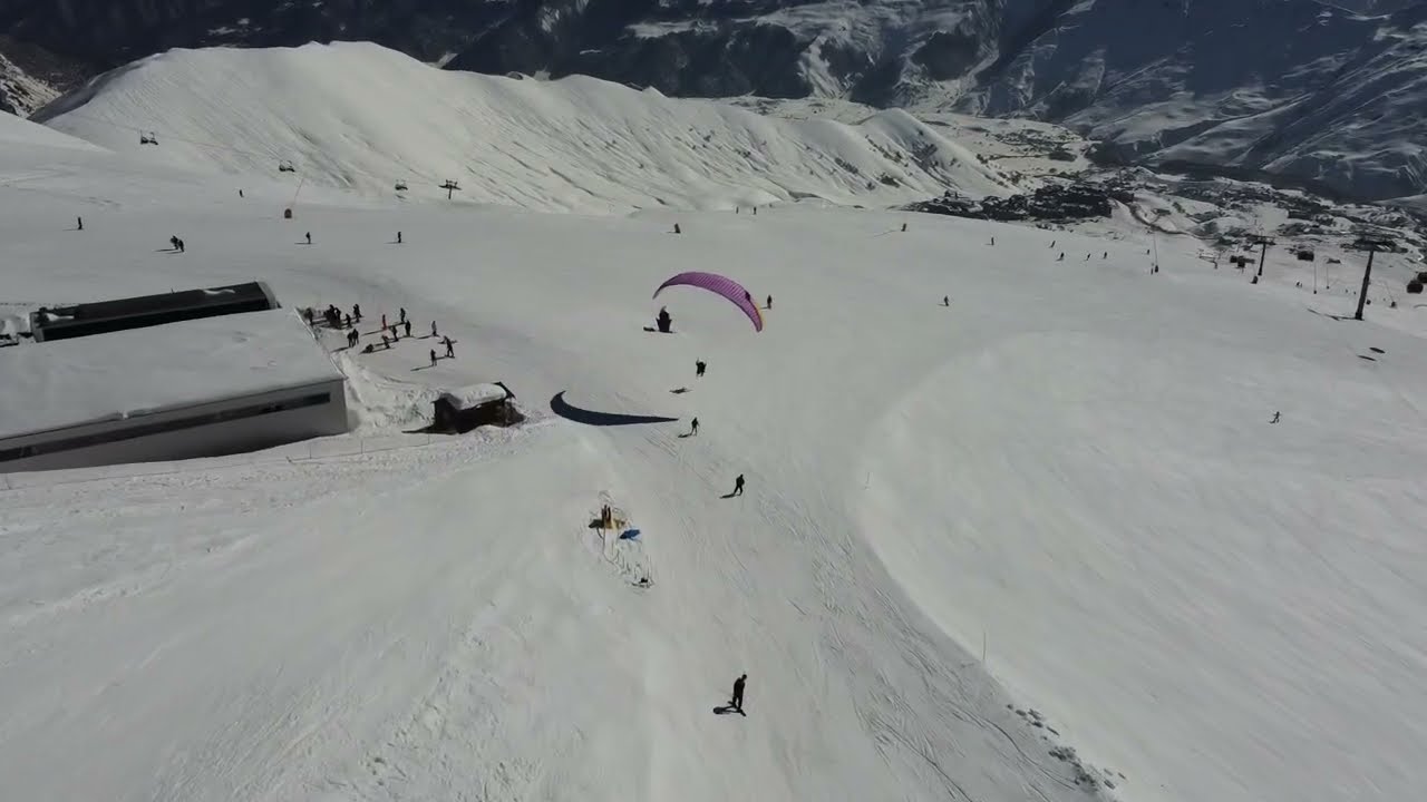 Bird's Eye Bliss: Paragliding Adventure Above Gudauri Ski Resort Drone