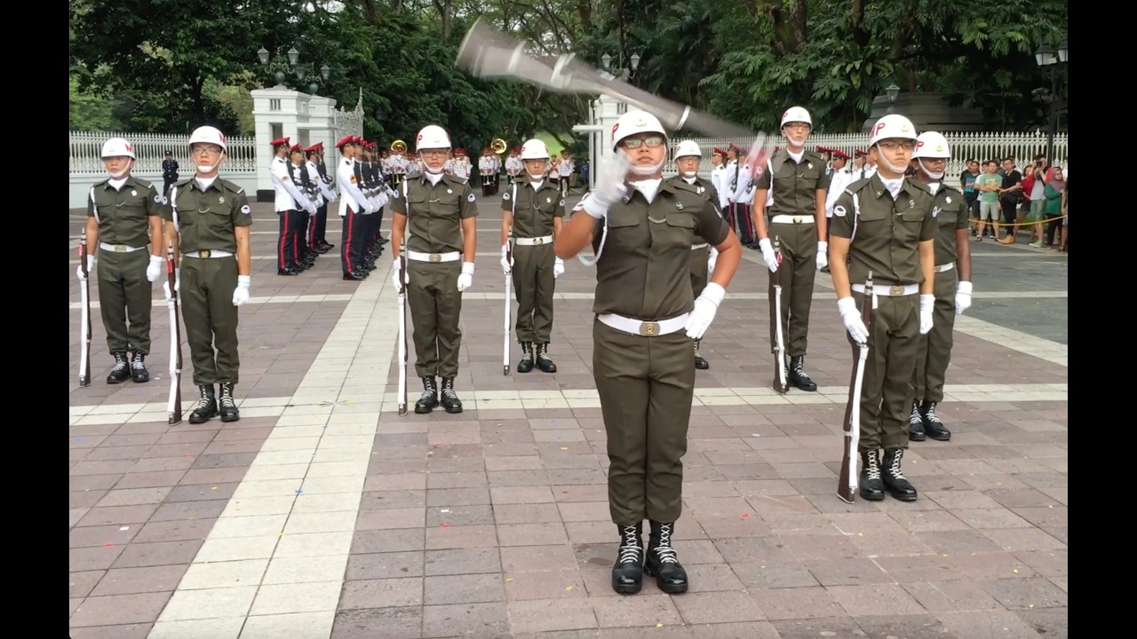Dropped rifle in Singapore precision drill display