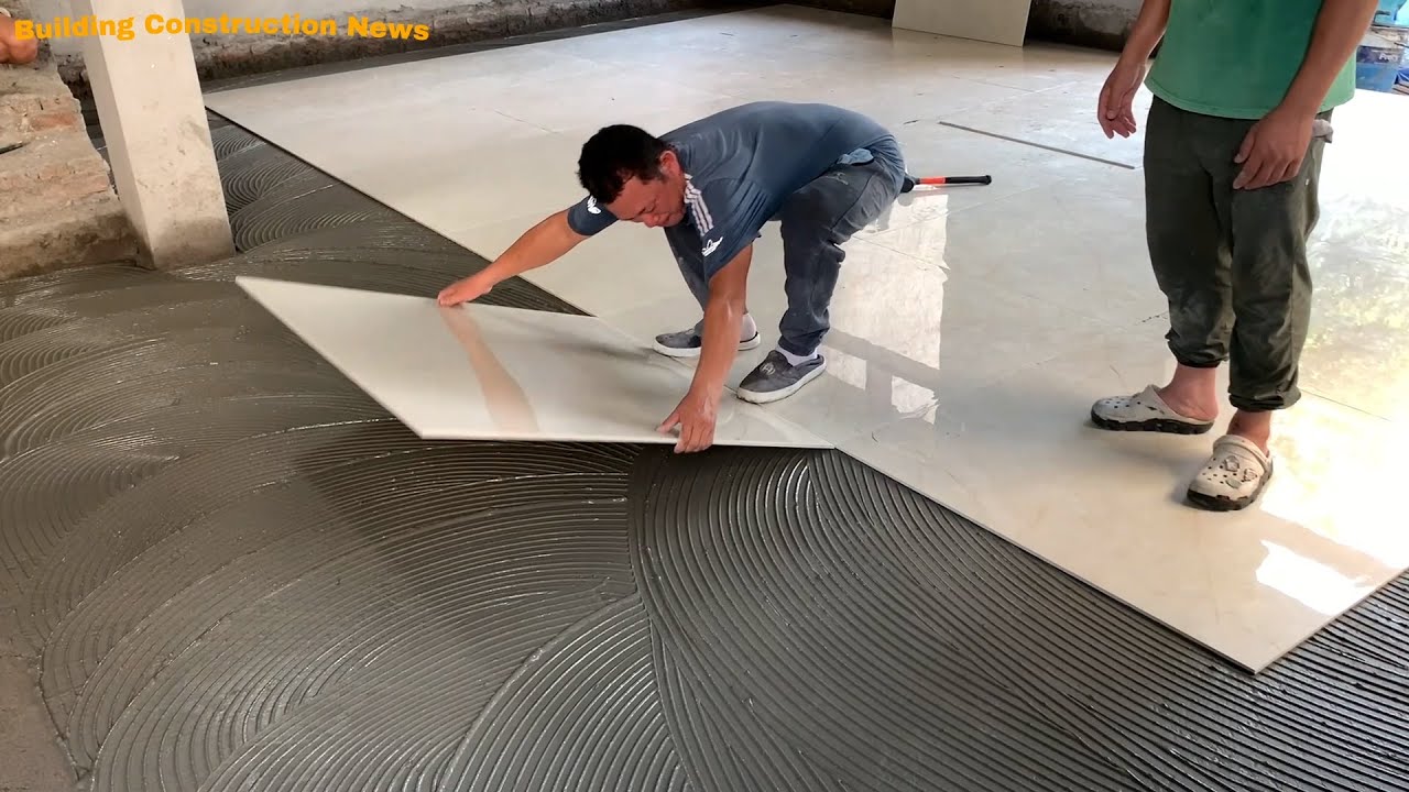 Professional Living Room Floor Construction Skills Using High-Quality Ceramic Tiles Size 100 x 100cm