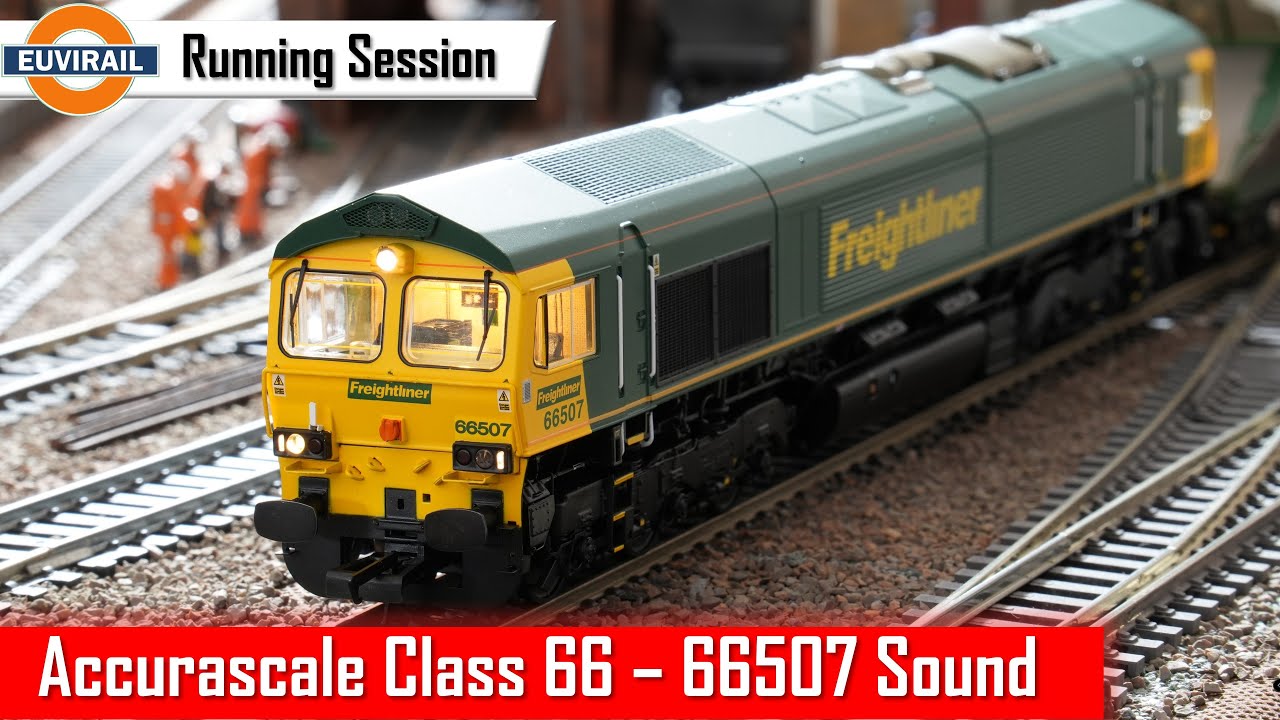 Accurascale Class 66 66507 DCC Sound Freghtliner Livery pulling a rake of Bachmann HHA hopper wagons