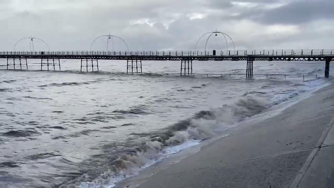 High tide and walk along Southport sea wall and under Pier