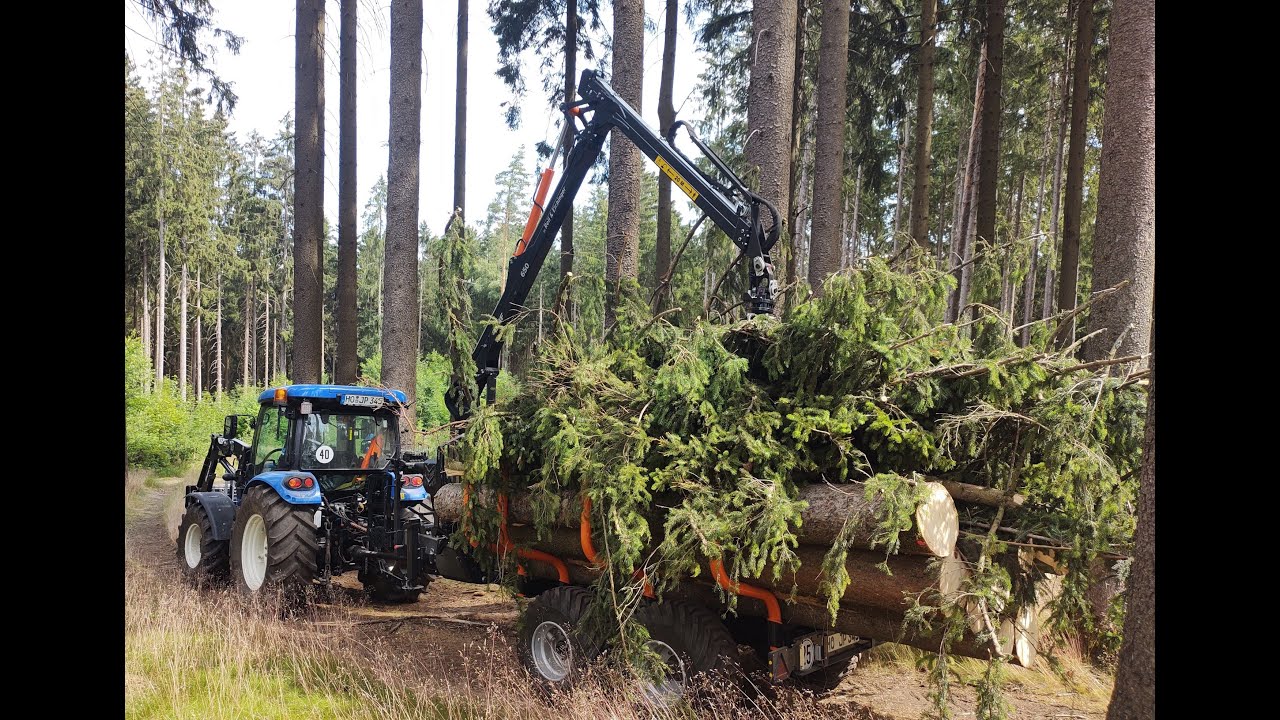 New Holland T4s mit BMF 8T1 / 650 Rückewagen