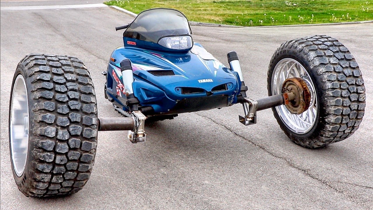 I Put GIANT Truck Wheels On A Snowmobile!