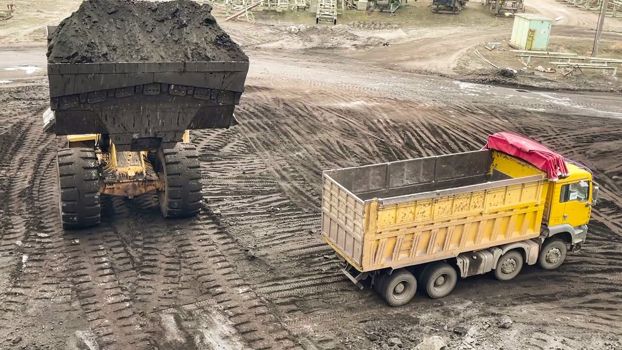 Huge Caterpillar 992G Wheel Loader Loading Coal On Trucks - Sotiriadis/Labrianidis Mining Works