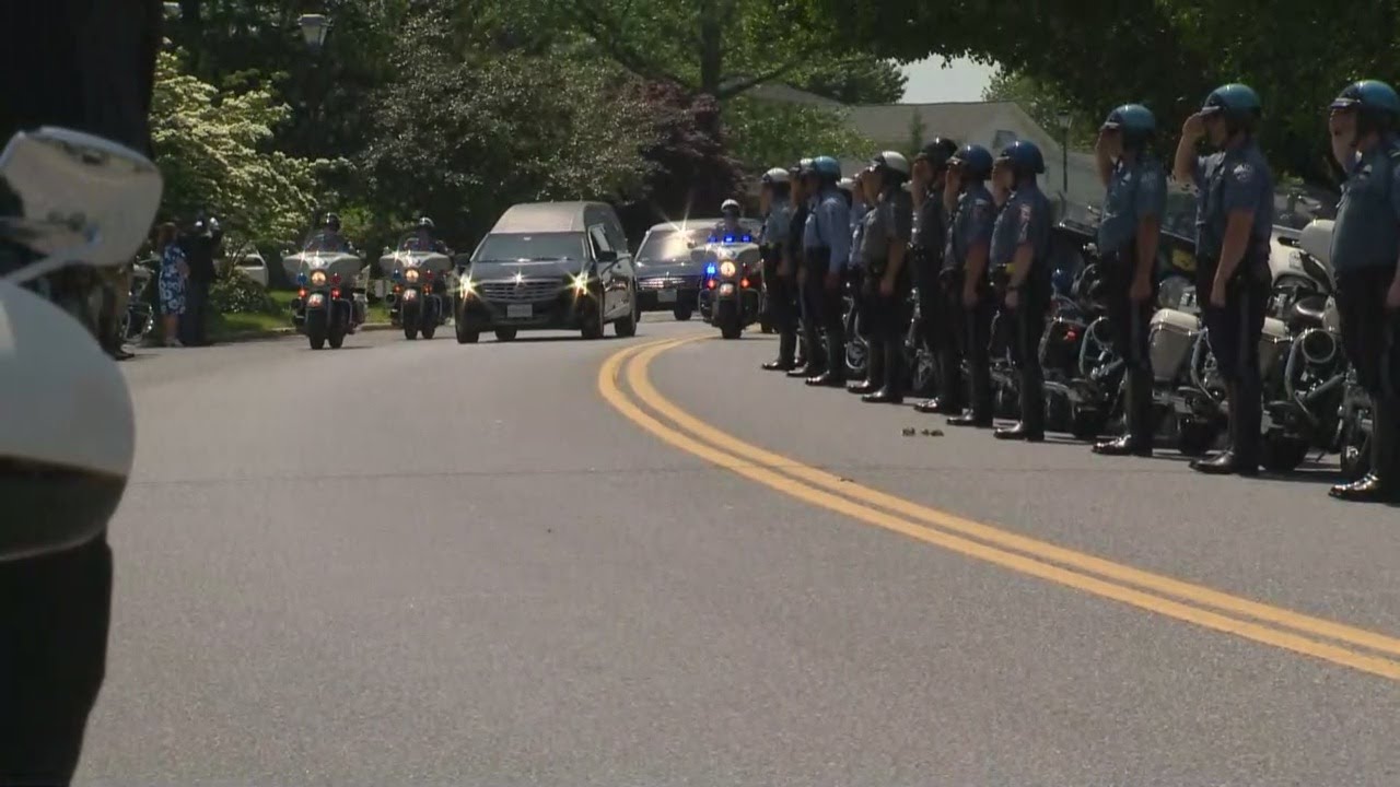Hearse carrying Ofc. Amy Caprio arrives at Dulaney Valley Memorial gardens