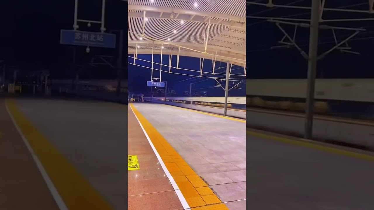 High-speed train from Beijing to Shanghai with speed of 400hm/h passing by Suzhou North Station.