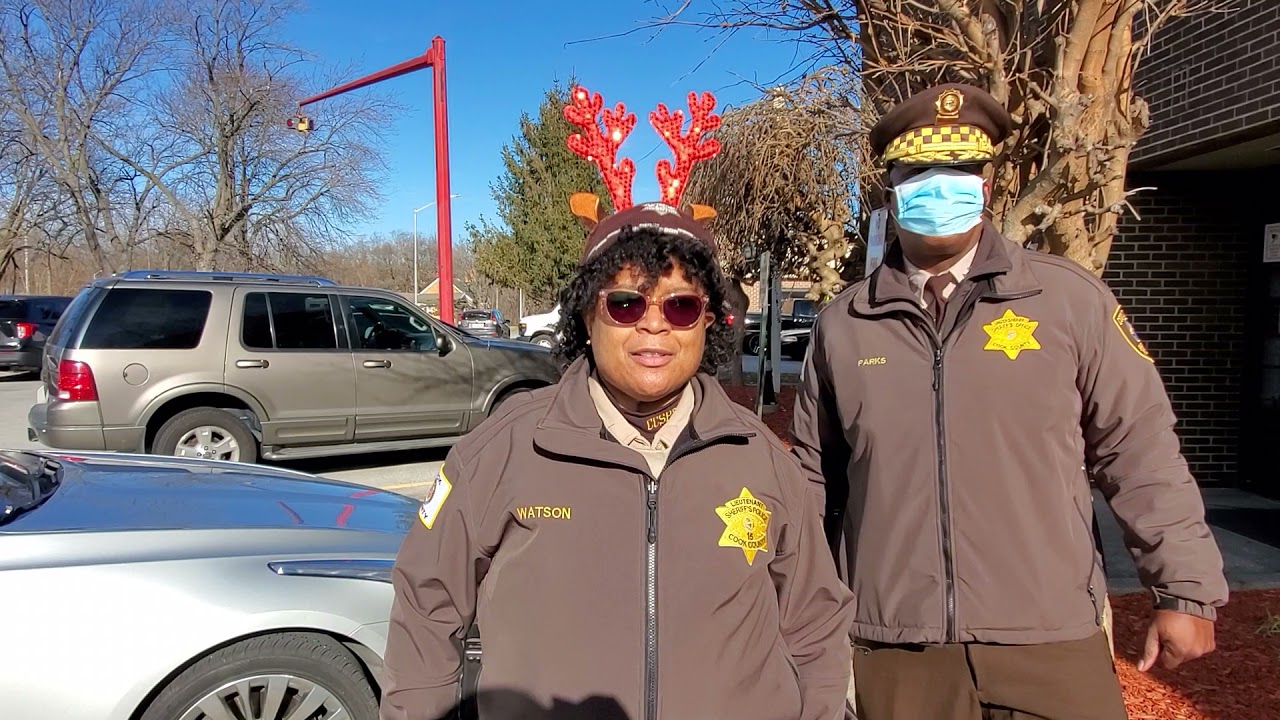 Undersheriff Marlon Parks and Lieutenant Watson on the Senior Secret Santa event in Ford Heights