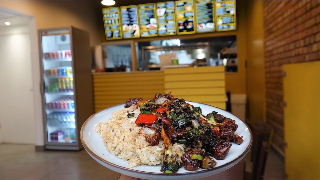 Indo-Chinese: Garlic Mushroom | Fried Rice | Masala Chips | Chilli Paneer Roll + more at Wok & Slice