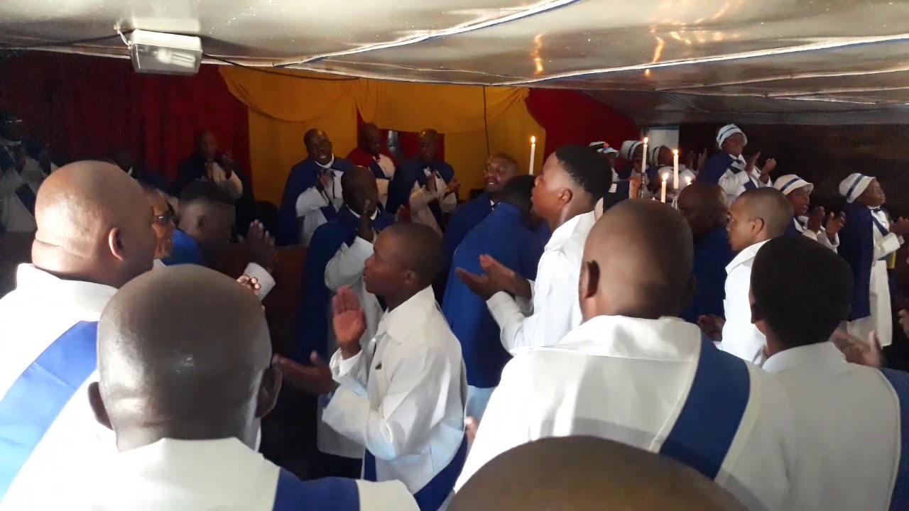St Johns - Father Qhinebe