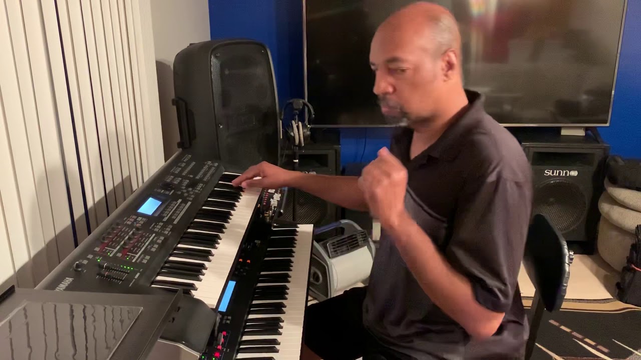 Dennis Williams playing the keyboard