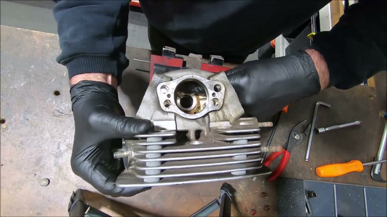 Ducati DS cylinder head strip for reco and then refitting rockers and valve stem seals.