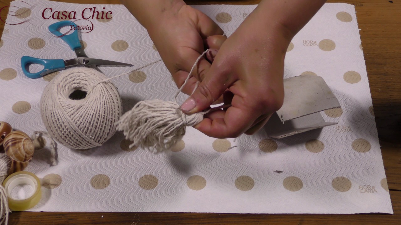 La nappina di spago e conchiglie