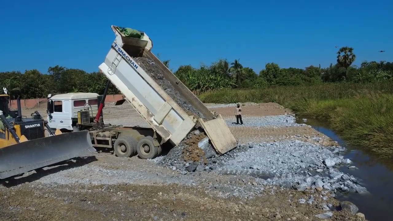 Large-scale lake clearing project using modern machinery