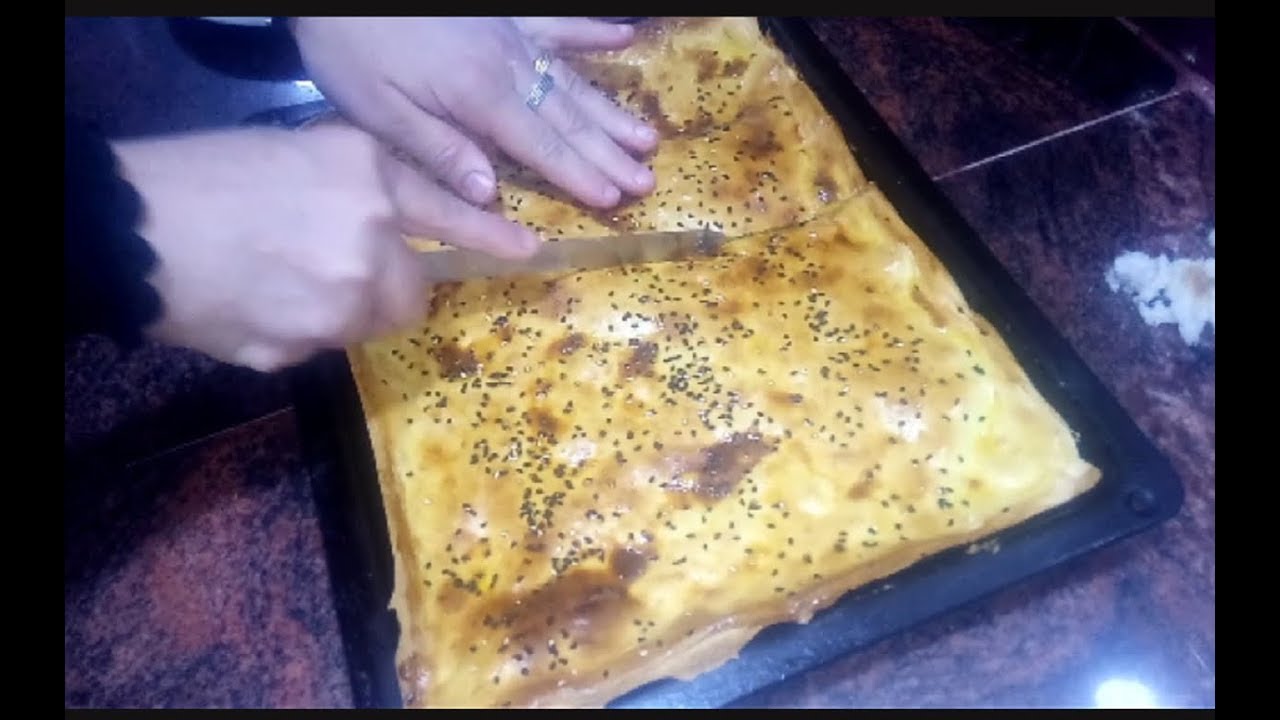 واخيرا لقيت الحل بعد ماحرت واش تطيب للعشا  كوكا او فطيرة عشر دقائق سريعة