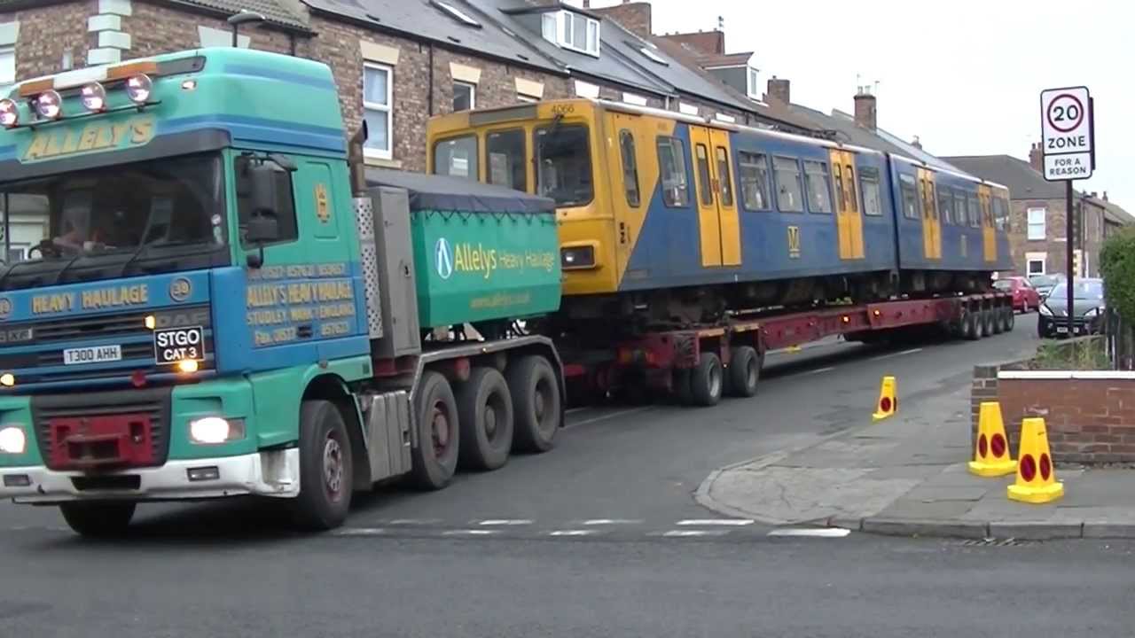 Tyne and Wear Metro - Metrocar 4066 going to and Metrocar 4034 returning from refurbishment.