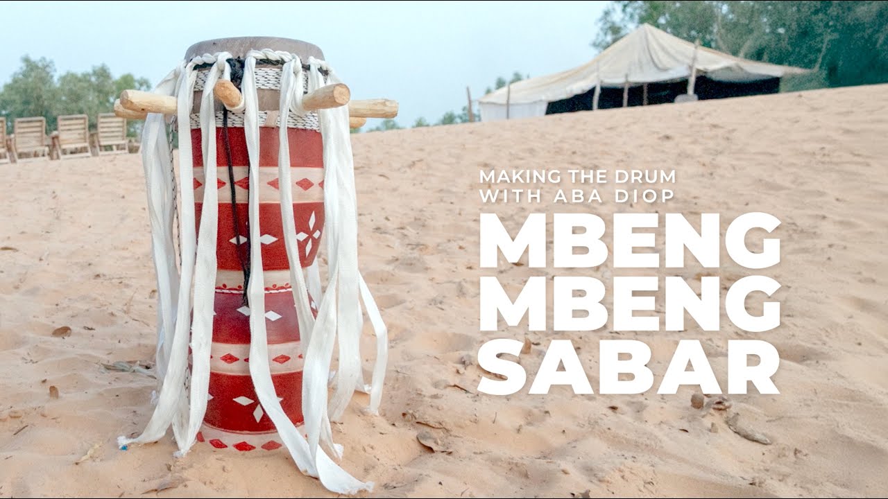 Skinning a Senegalese traditional drum&mdash;Mbeng Mbeng Sabar