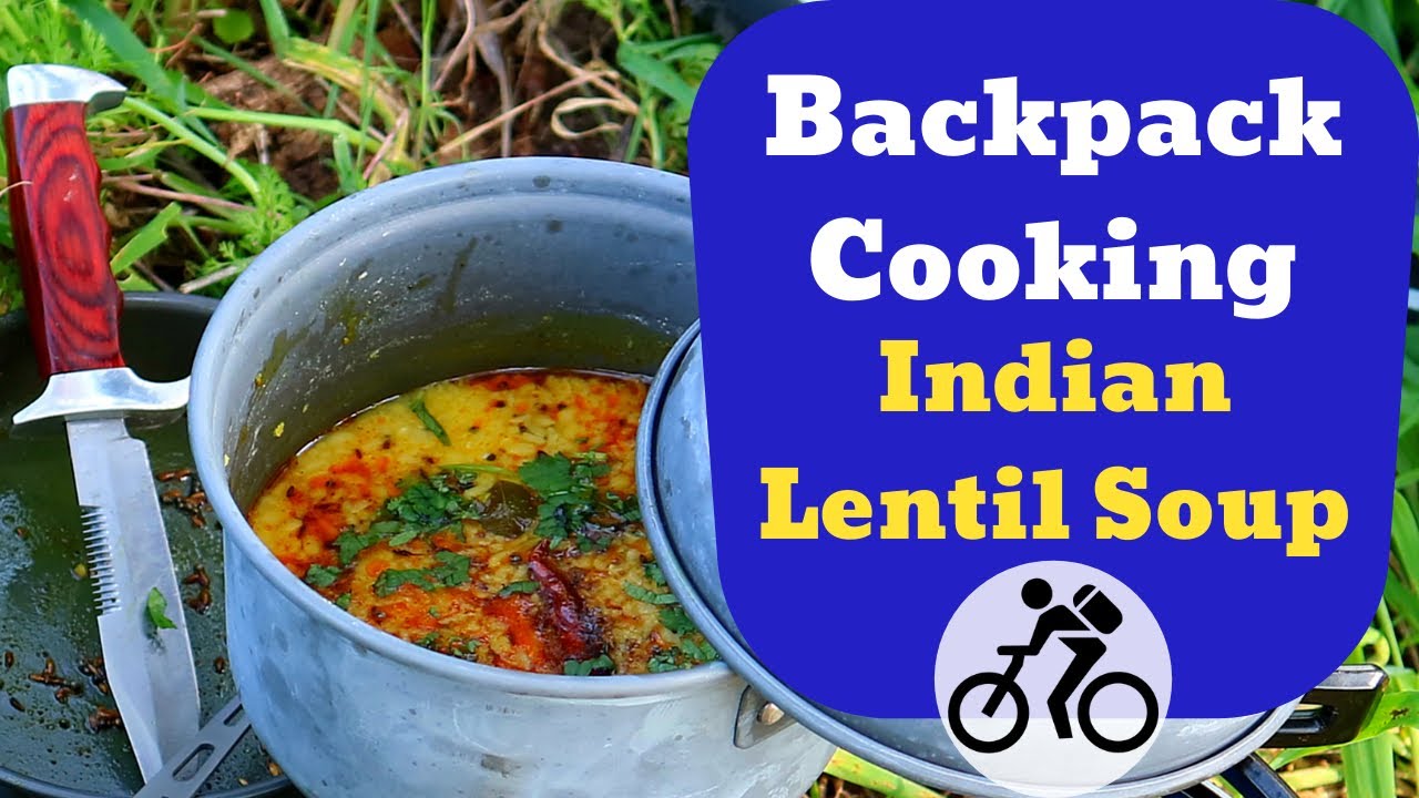 Outdoor Cooking Spicy Lentil Soup On Bicycle Touring. Food For Backpacking Meals When Tired Outdoors